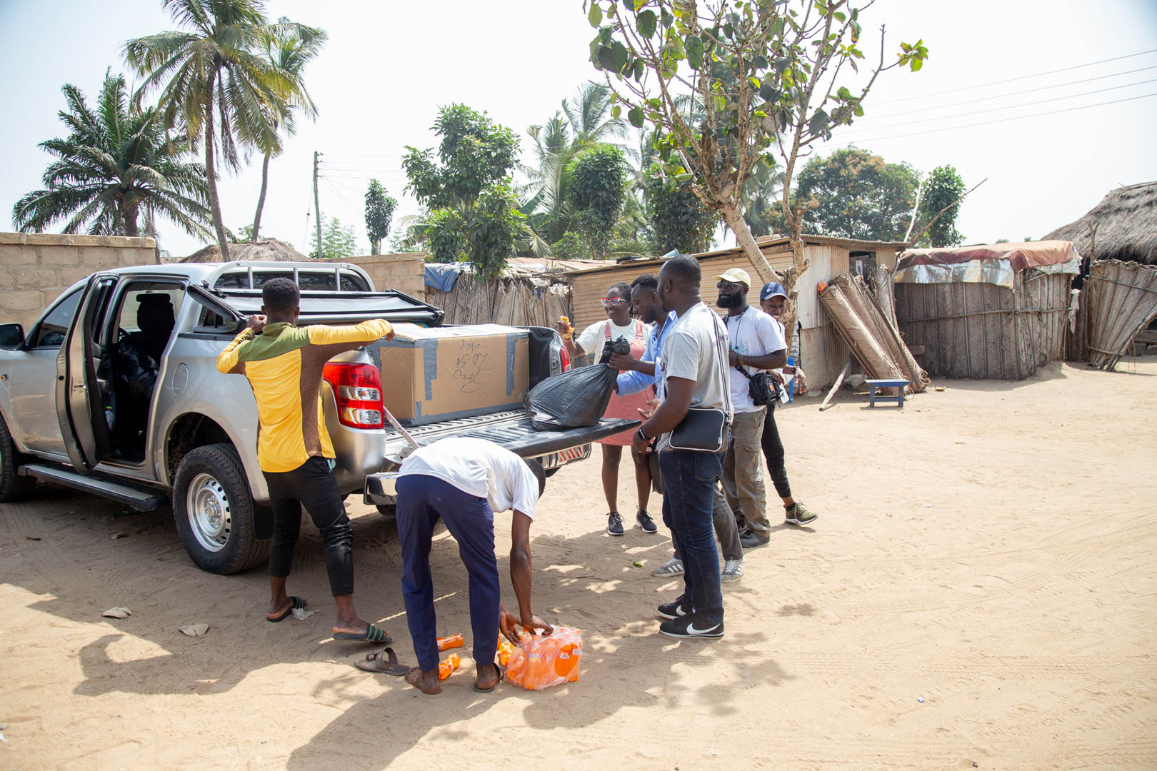 Ofloading charity items from a van-courtesy smileatschool